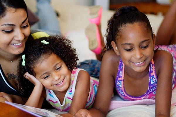 Mom reading with her 2 daughters - CRF Phoenix